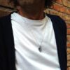 Collana con Clessidra a ciondolo in argento indossata