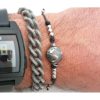 Bracciale Mappamondo con cordino nero indossato
