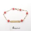 Bracciale personalizzabile da neonato in oro e coralli con nome inciso