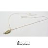 Collana con foglia in oro con smeraldi