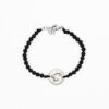 bracciale in pietra lavica con medaglietta in argento e pantera incisa