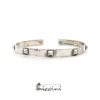 Bracciale rigido con borchie punk in argento