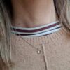 Collana con cuore in oro personalizzabile con incisione, indossata