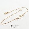 Bracciale in oro giallo con nome traforato a mano