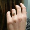 solitario con diamante grigio in oro e argento