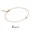 bracciale a filo in oro giallo con diamante