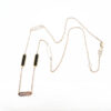 collana in oro giallo 18kt con inserti onice e madreperla
