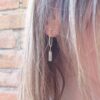 orecchini lunghi con onice e madreperla in oro giallo