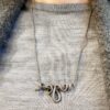 collana in argento con serpente attorcigliato