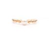 Anello in oro rosa con perla e sfere digradanti