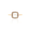 anello in oro rosa con topazio azzurro quadrato e zirconi