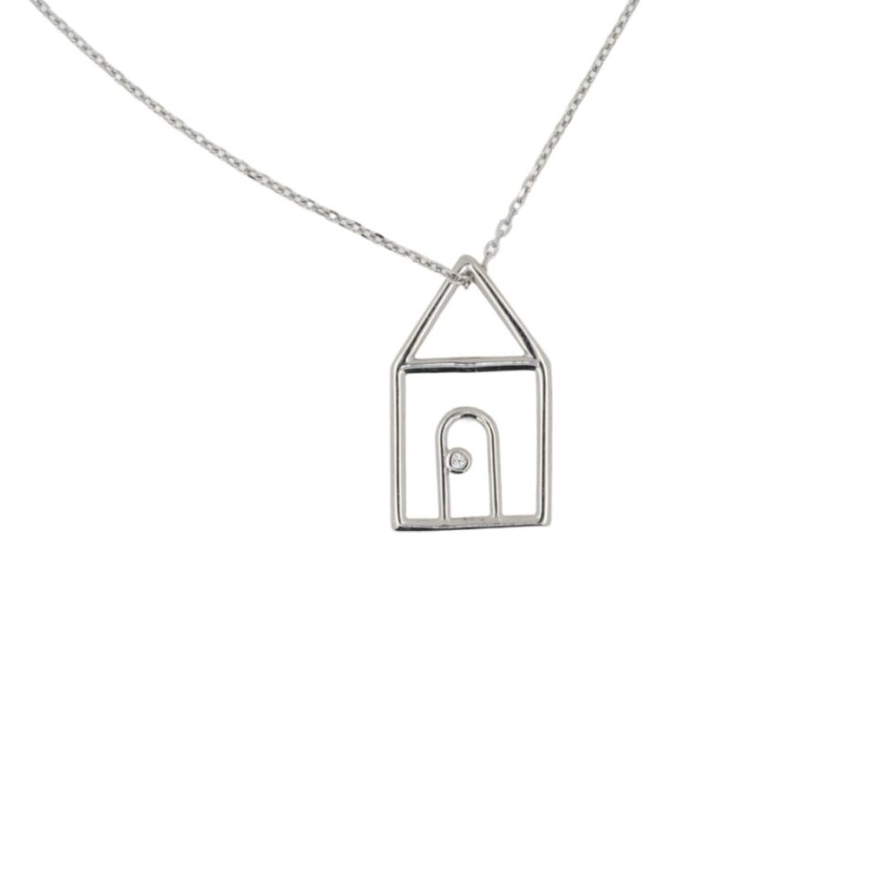 ciondolo a forma di casa in argento rodiato con zircone sulla porta
