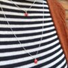 Collana in argento con pendente in corallo a forma di cuore
