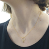 collana girocollo in argento dorato con pendente a forma di lampadina