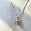 collana con ciondolo a forma di testa di orso