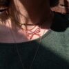 collana con fiocco rosa