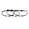 bracciali in cordino nero , diamante e tre ori