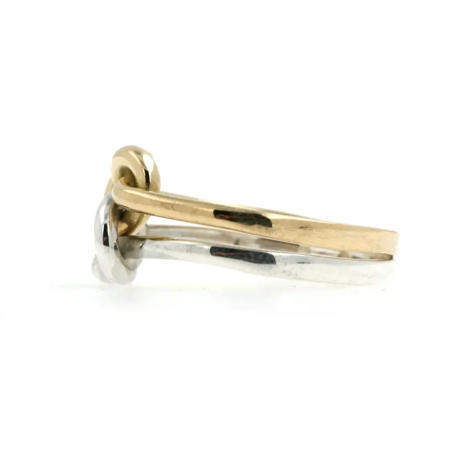 Anello nodi intrecciati in oro e argento