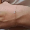 bracciale in oro con diamante a forma di cuore